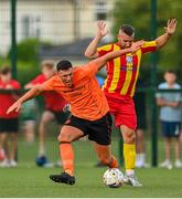 23 July 2021; Jordan Cromwell of St Kevin's Boys in action against Sean Harding of Kilnamanagh during the FAI Cup First Round match between St. Kevin's Boys and Kilnamanagh at St Aidan’s CBS in Whitehall, Dublin. Photo by Eóin Noonan/Sportsfile