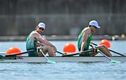 24 July 2021; Ronan Byrne, left, and Philip Doyle of Ireland react after finishing in 3rd place during the Men's Double Sculls repechage at the Sea Forest Waterway during the 2020 Tokyo Summer Olympic Games in Tokyo, Japan. Photo by Seb Daly/Sportsfile