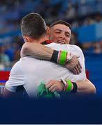 24 July 2021; Rhys McClenaghan of Ireland with national gymnastics coach Luke Carson after competing on the Pommel Horse in artistic gymnastics qualification at the Ariake Gymnastics Centre during the 2020 Tokyo Summer Olympic Games in Tokyo, Japan. Photo by Ramsey Cardy/Sportsfile