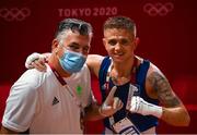 24 July 2021; Kurt Walker of Ireland and coach John Conlan following his Men's Featherweight round of 32 bout with Jose Quiles Brotons of Spain at the Kokugikan Arena during the 2020 Tokyo Summer Olympic Games in Tokyo, Japan. Photo by Stephen McCarthy/Sportsfile