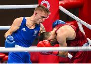 24 July 2021; Kurt Walker of Ireland, left, and Jose Quiles Brotons of Spain during their Men's Featherweight round of 32 bout at the Kokugikan Arena during the 2020 Tokyo Summer Olympic Games in Tokyo, Japan. Photo by Stephen McCarthy/Sportsfile