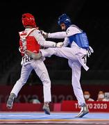 24 July 2021; Ramnarong Sawekwiharee of Thailand, left, and Safwan Khalil of Australia in action during the men's -58Kg taekwondo round of 16 at the Makuhari Messe Hall during the 2020 Tokyo Summer Olympic Games in Tokyo, Japan. Photo by Brendan Moran/Sportsfile