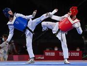 24 July 2021; Jack Woolley of Ireland, right, in action against Lucas Lautaro Guzman of Argentina during the men's -58Kg taekwondo round of 16 at the Makuhari Messe Hall during the 2020 Tokyo Summer Olympic Games in Tokyo, Japan. Photo by Brendan Moran/Sportsfile