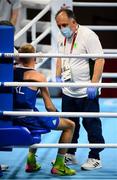 24 July 2021; Ireland coach Zaur Antia speaks to his boxer Kurt Walker their Men's Featherweight round of 32 bout with Jose Quiles Brotons of Spain at the Kokugikan Arena during the 2020 Tokyo Summer Olympic Games in Tokyo, Japan. Photo by Stephen McCarthy/Sportsfile