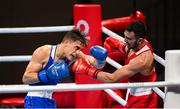 24 July 2021; Aliaksandr Radzionau of Belarus, left, and Necat Ekinci of Turkey during their Men's Welterweight round of 32 bout at the Kokugikan Arena during the 2020 Tokyo Summer Olympic Games in Tokyo, Japan. Photo by Stephen McCarthy/Sportsfile