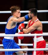24 July 2021; Aliaksandr Radzionau of Belarus, left, and Necat Ekinci of Turkey during their Men's Welterweight round of 32 bout at the Kokugikan Arena during the 2020 Tokyo Summer Olympic Games in Tokyo, Japan. Photo by Stephen McCarthy/Sportsfile