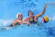 24 July 2021; Rachel Fattal of USA and Yumi Arima of Japan in action during the Women's Preliminary Round Group B match between Japan and United States at the Tatsumi Water Polo Centre during the 2020 Tokyo Summer Olympic Games in Tokyo, Japan. Photo by Ramsey Cardy/Sportsfile