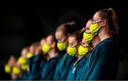 24 July 2021; The Australia team, wearing face masks, line up for the National Anthem before the Women's Preliminary Round Group A match between Canada and Australia at the Tatsumi Water Polo Centre during the 2020 Tokyo Summer Olympic Games in Tokyo, Japan. Photo by Ramsey Cardy/Sportsfile