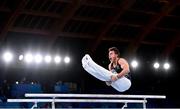 24 July 2021; Mikhail Koudinov of New Zealand competes on the Parallel Bars in artistic gymnastics qualification at the Ariake Gymnastics Centre during the 2020 Tokyo Summer Olympic Games in Tokyo, Japan. Photo by Ramsey Cardy/Sportsfile