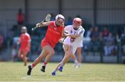 24 July 2021; Katie Walsh of Cork in action against Maria Doyle of Kildare during the All Ireland Intermediate Camogie Championship match between Kildare and Cork at Manguard Plus Kildare GAA Centre of Excellence in Newbridge, Kildare. Photo by Daire Brennan/Sportsfile