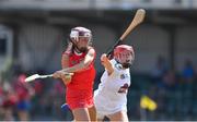 24 July 2021; Katie Walsh of Cork in action against Maria Doyle of Kildare during the All Ireland Intermediate Camogie Championship match between Kildare and Cork at Manguard Plus Kildare GAA Centre of Excellence in Newbridge, Kildare. Photo by Daire Brennan/Sportsfile