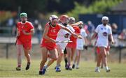 24 July 2021; Katie Walsh of Cork in action against Maria Doyle of Kildare during the All Ireland Intermediate Camogie Championship match between Kildare and Cork at Manguard Plus Kildare GAA Centre of Excellence in Newbridge, Kildare. Photo by Daire Brennan/Sportsfile