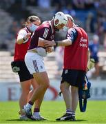 24 July 2021; Joe Canning of Galway is attended to by chartered physiotherapist Rachel Wyer and the team doctor Dr Ian O'Connor after being struck on the wrist near the end of the first half during the GAA Hurling All-Ireland Senior Championship Round 2 match between Waterford and Galway at Semple Stadium in Thurles, Tipperary. Photo by Ray McManus/Sportsfile
