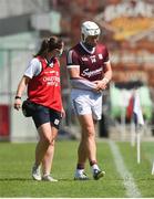 24 July 2021; Joe Canning of Galway leaves the field with chartered physiotherapist Rachel Wyer after being struck on the wrist near the end of the first half during the GAA Hurling All-Ireland Senior Championship Round 2 match between Waterford and Galway at Semple Stadium in Thurles, Tipperary. Photo by Harry Murphy/Sportsfile