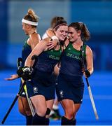 24 July 2021; Ireland players Roisin Upton, left, and Lizzy Holden celebrate following victory in the Women's Pool A Group Stage match between Ireland and South Africa at the Oi Hockey Stadium during the 2020 Tokyo Summer Olympic Games in Tokyo, Japan. Photo by Ramsey Cardy/Sportsfile