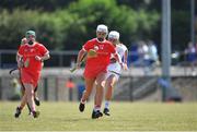 24 July 2021; Kate Wall of Cork in action against Niamh Hegarty of Kildare during the All Ireland Intermediate Camogie Championship match between Kildare and Cork at Manguard Plus Kildare GAA Centre of Excellence in Newbridge, Kildare. Photo by Daire Brennan/Sportsfile