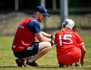 24 July 2021; Cork manager Mark McCarthy speaks with Rachel O’Shea ahead of the All Ireland Intermediate Camogie Championship match between Kildare and Cork at Manguard Plus Kildare GAA Centre of Excellence in Newbridge, Kildare. Photo by Daire Brennan/Sportsfile