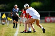 24 July 2021; Fiona Neville of Cork in action against Niamh Hegarty of Kildare during the All Ireland Intermediate Camogie Championship match between Kildare and Cork at Manguard Plus Kildare GAA Centre of Excellence in Newbridge, Kildare. Photo by Daire Brennan/Sportsfile