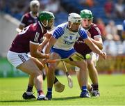 24 July 2021; Dessie Hutchinson of Waterford is tackled by Adrian Tuohey, left, and Jack Fitzpatrick of Galway during the GAA Hurling All-Ireland Senior Championship Round 2 match between Waterford and Galway at Semple Stadium in Thurles, Tipperary. Photo by Ray McManus/Sportsfile