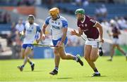 24 July 2021; Billy Power of Waterford races clear of Adrian Tuohey of Galway during the GAA Hurling All-Ireland Senior Championship Round 2 match between Waterford and Galway at Semple Stadium in Thurles, Tipperary. Photo by Ray McManus/Sportsfile