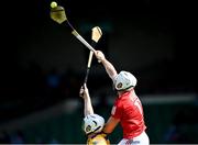 23 July 2021; Patrick Horgan of Cork gets to the ball ahead of Conor Cleary during the GAA Hurling All-Ireland Senior Championship Round 2 match between Clare and Cork at LIT Gaelic Grounds in Limerick. Photo by Piaras Ó Mídheach/Sportsfile
