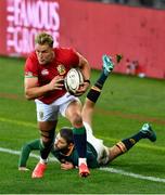 24 July 2021; Duhan van der Merwe of the British and Irish Lions evades the tackle of Willie le Roux of South Africa during the first test of the British and Irish Lions tour match between South Africa and British and Irish Lions at Cape Town Stadium in Cape Town, South Africa. Photo by Ashley Vlotman/Sportsfile