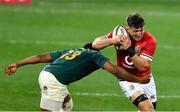 24 July 2021; Tom Curry of the British and Irish Lions in action against Lukhanyo Am of South Africa during the first test of the British and Irish Lions tour match between South Africa and British and Irish Lions at Cape Town Stadium in Cape Town, South Africa. Photo by Ashley Vlotman/Sportsfile