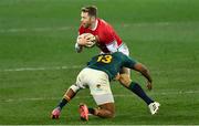 24 July 2021; Elliot Daly of the British and Irish Lions is tackled by Lukhanyo Am of South Africa during the first test of the British and Irish Lions tour match between South Africa and British and Irish Lions at Cape Town Stadium in Cape Town, South Africa. Photo by Ashley Vlotman/Sportsfile