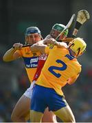 23 July 2021; Robbie O'Flynn of Cork is tackled by David McInerney, left, and Rory Hayes of Clare during the GAA Hurling All-Ireland Senior Championship Round 2 match between Clare and Cork at LIT Gaelic Grounds in Limerick. Photo by Eóin Noonan/Sportsfile