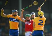 23 July 2021; Robbie O'Flynn of Cork is tackled by David McInerney, left, and Rory Hayes of Clare during the GAA Hurling All-Ireland Senior Championship Round 2 match between Clare and Cork at LIT Gaelic Grounds in Limerick. Photo by Eóin Noonan/Sportsfile