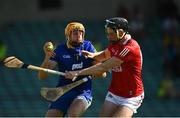 23 July 2021; Clare goalkeeper Eibhear Quilligan is tackled by Jack O'Connor of Cork during the GAA Hurling All-Ireland Senior Championship Round 2 match between Clare and Cork at LIT Gaelic Grounds in Limerick. Photo by Eóin Noonan/Sportsfile