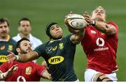 24 July 2021; Duhan van der Merwe, right, and Robbie Henshaw of the British and Irish Lions in action against Cheslin Kolbe of South Africa during the first test of the British and Irish Lions tour match between South Africa and British and Irish Lions at Cape Town Stadium in Cape Town, South Africa. Photo by Ashley Vlotman/Sportsfile