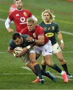 24 July 2021; Handré Pollard of South Africa is tackled by Duhan van der Merwe of the British and Irish Lions during the first test of the British and Irish Lions tour match between South Africa and British and Irish Lions at Cape Town Stadium in Cape Town, South Africa. Photo by Ashley Vlotman/Sportsfile