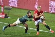 24 July 2021; Duhan van der Merwe of the British and Irish Lions evades the tackle of Willie le Roux of South Africa during the first test of the British and Irish Lions tour match between South Africa and British and Irish Lions at Cape Town Stadium in Cape Town, South Africa. Photo by Ashley Vlotman/Sportsfile