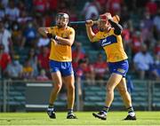 23 July 2021; Clare players John Conlon, right, and Cathal Malone protest to referee John Keenan during the GAA Hurling All-Ireland Senior Championship Round 2 match between Clare and Cork at LIT Gaelic Grounds in Limerick. Photo by Eóin Noonan/Sportsfile