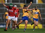 23 July 2021; David Reidy is tackled by Shane Kingston of Cork during the GAA Hurling All-Ireland Senior Championship Round 2 match between Clare and Cork at LIT Gaelic Grounds in Limerick. Photo by Piaras Ó Mídheach/Sportsfile