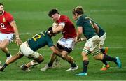 24 July 2021; Tom Curry of British and Irish Lions is tackled by Damian de Allende of South Africa during the first test of the British and Irish Lions tour match between South Africa and British and Irish Lions at Cape Town Stadium in Cape Town, South Africa. Photo by Ashley Vlotman/Sportsfile