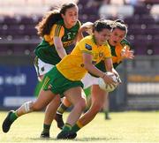 24 July 2021; Geraldine McLaughlin of Donegal in action against Kayleigh Cronin and Ciara Murphy of Kerry during the TG4 All-Ireland Senior Ladies Football Championship Group 4 Round 3 match between Donegal and Kerry at Tuam Stadium in Galway. Photo by Matt Browne/Sportsfile