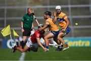 23 July 2021; Ger Millerick of Cork in action against David Reidy, centre, and Aidan McCarthy of Clare during the GAA Hurling All-Ireland Senior Championship Round 2 match between Clare and Cork at LIT Gaelic Grounds in Limerick. Photo by Piaras Ó Mídheach/Sportsfile