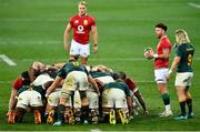 24 July 2021; Ali Price of the British and Irish Lions and Faf de Klerk of South Africa watch on as the packs perpare for a scrum during the first test of the British and Irish Lions tour match between South Africa and British and Irish Lions at Cape Town Stadium in Cape Town, South Africa. Photo by Ashley Vlotman/Sportsfile