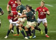 24 July 2021; Kwagga Smith of South Africa evades the tackle of Elliot Daly, left, of British and Irish Lions during the first test of the British and Irish Lions tour match between South Africa and British and Irish Lions at Cape Town Stadium in Cape Town, South Africa. Photo by Ashley Vlotman/Sportsfile