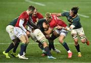 24 July 2021; Kwagga Smith, hidden, of South Africa is tackled by Duhan van der Merwe of the British and Irish Lions during the first test of the British and Irish Lions tour match between South Africa and British and Irish Lions at Cape Town Stadium in Cape Town, South Africa. Photo by Ashley Vlotman/Sportsfile