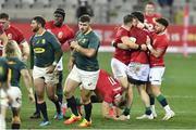 24 July 2021; Ali Price, right, and Luke Cowan-Dickie of British and Irish Lions celebrate with team-mate Tom Curry, centre, after winning the scrum during the first test of the British and Irish Lions tour match between South Africa and British and Irish Lions at Cape Town Stadium in Cape Town, South Africa. Photo by Ashley Vlotman/Sportsfile