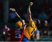 23 July 2021; Tony Kelly of Clare catches the ball over Niall O'Leary of Cork during the GAA Hurling All-Ireland Senior Championship Round 2 match between Clare and Cork at LIT Gaelic Grounds in Limerick. Photo by Piaras Ó Mídheach/Sportsfile