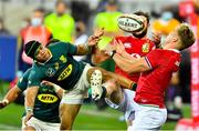 24 July 2021; Robbie Henshaw, hidden, and Duhan van der Merwe, right, of British and Irish Lions in action against Cheslin Kolbe of South Africa during the first test of the British and Irish Lions tour match between South Africa and British and Irish Lions at Cape Town Stadium in Cape Town, South Africa. Photo by Ashley Vlotman/Sportsfile