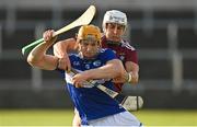 24 July 2021; Podge Delaney of Laois in action against Joey Boyle of Westmeath during the Allianz Hurling League Division 1 Relegation Play-off match between Laois and Westmeath at MW Hire O'Moore Park in Portlaoise, Co Laois. Photo by Harry Murphy/Sportsfile