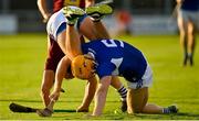 24 July 2021; Podge Delaney of Laois in action against Davy Glennon of Westmeath during the Allianz Hurling League Division 1 Relegation Play-off match between Laois and Westmeath at MW Hire O'Moore Park in Portlaoise, Co Laois. Photo by Harry Murphy/Sportsfile