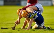 24 July 2021; Podge Delaney of Laois in action against Davy Glennon of Westmeath during the Allianz Hurling League Division 1 Relegation Play-off match between Laois and Westmeath at MW Hire O'Moore Park in Portlaoise, Co Laois. Photo by Harry Murphy/Sportsfile