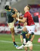 24 July 2021; Cheslin Kolbe of South Africa and Liam Williams of the British and Irish Lions compete for the ball in the air during the first test of the British and Irish Lions tour match between South Africa and British and Irish Lions at Cape Town Stadium in Cape Town, South Africa. Photo by Ashley Vlotman/Sportsfile