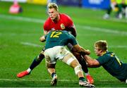 24 July 2021; Duhan van der Merwe of British and Irish Lions is tackled by Damian de Allende of South Africa during the first test of the British and Irish Lions tour match between South Africa and British and Irish Lions at Cape Town Stadium in Cape Town, South Africa. Photo by Ashley Vlotman/Sportsfile